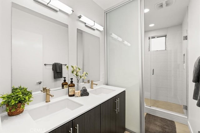 1923 N Gower St, Los Angeles, CA 90068 - bathroom with a shower stall, double vanity, and recessed lighting