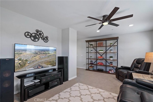 carpeted living area with recessed lighting, a ceiling fan, and baseboards