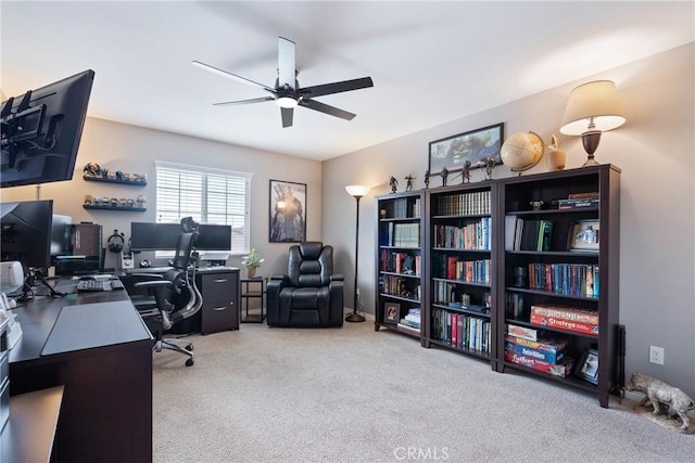 office space with ceiling fan and carpet flooring