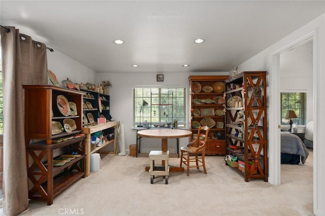 carpeted home office with a wealth of natural light and recessed lighting