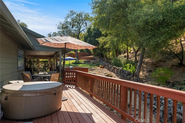 wooden deck with outdoor dining space