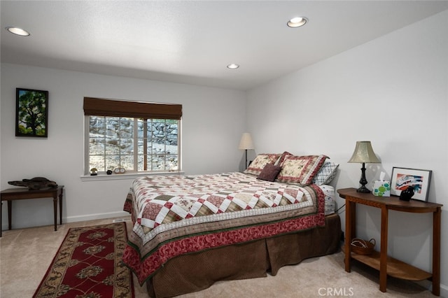 bedroom with carpet floors, recessed lighting, and baseboards