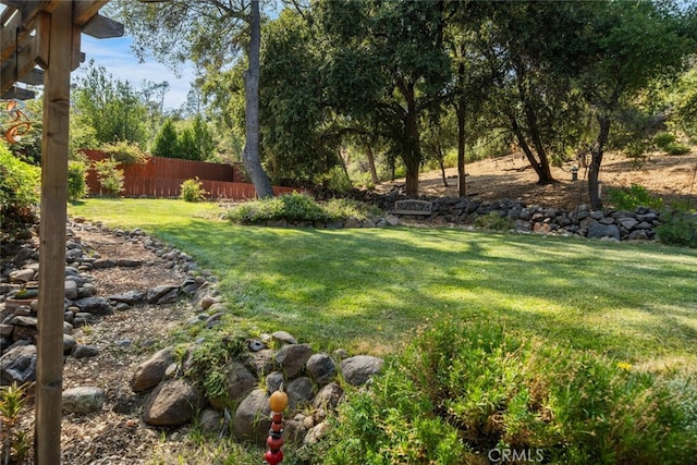 view of yard with fence