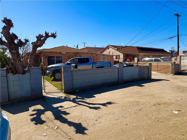 10321 Laurel Canyon Blvd, Pacoima, CA 91331 - view of front facade with a gate and fence private yard
