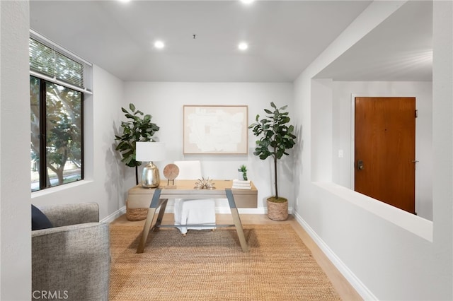 office space with recessed lighting and baseboards