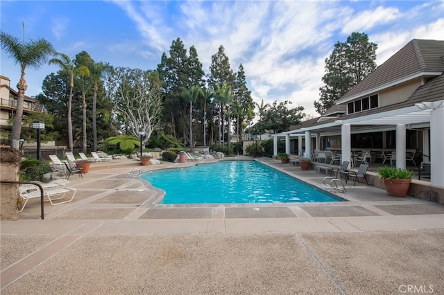 pool with a patio area