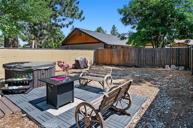 deck with a fenced backyard