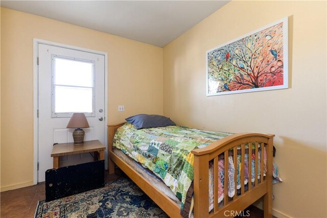 bedroom with tile patterned floors