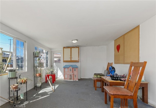 recreation room featuring baseboards