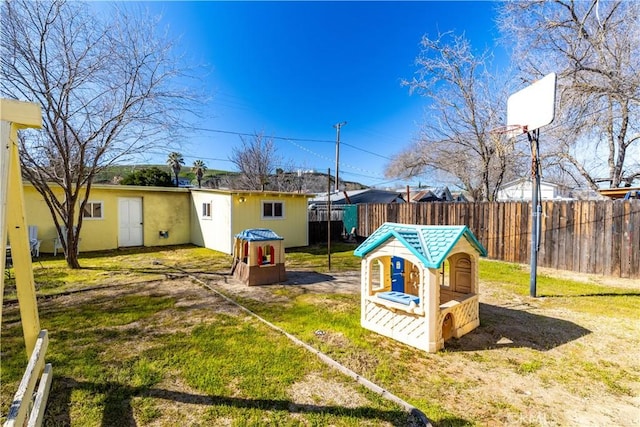 view of yard with fence