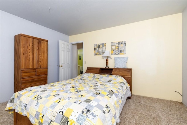 bedroom featuring carpet
