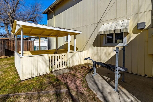 view of side of property with fence