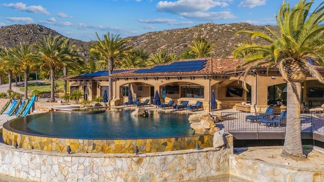 4065 Via Palo Verde Lago, Alpine, CA 91901 - view of swimming pool with a patio area, an infinity pool, and a mountain view