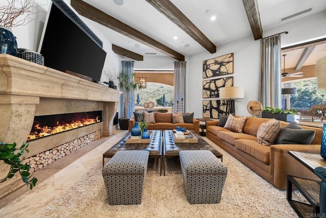 4065 Via Palo Verde Lago, Alpine, CA 91901 - living room featuring a healthy amount of sunlight, visible vents, a fireplace, and beam ceiling