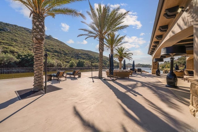 4065 Via Palo Verde Lago, Alpine, CA 91901 - view of community featuring a patio area, fence, and a mountain view