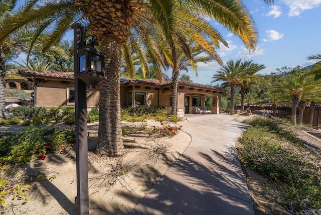 4065 Via Palo Verde Lago, Alpine, CA 91901 - mediterranean / spanish-style house with a tiled roof and stucco siding