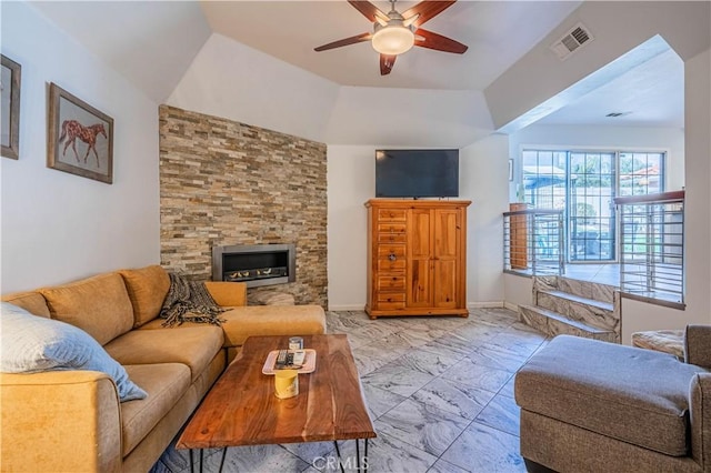 living room with marble finish floor, a fireplace, visible vents, a ceiling fan, and baseboards