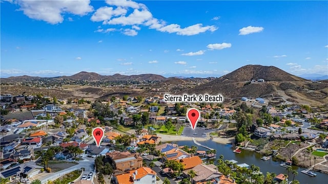 aerial view with a residential view and a water and mountain view