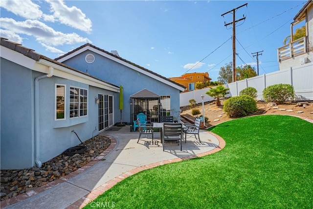 view of yard with a patio area and fence