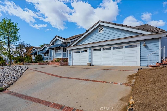 view of front of house with driveway and an attached garage