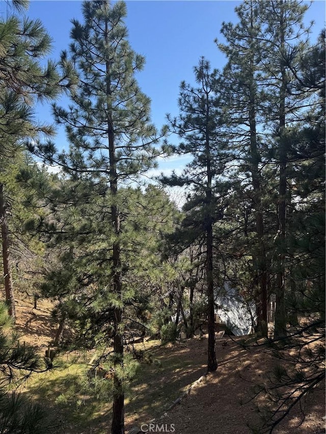 view of landscape with a view of trees