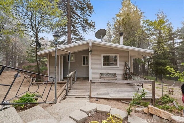 30919 Valley Oak Dr, Running Springs, CA 92382 - view of front of home featuring a wooden deck