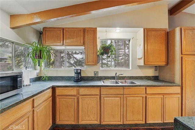 30919 Valley Oak Dr, Running Springs, CA 92382 - kitchen featuring stainless steel microwave and brown cabinets
