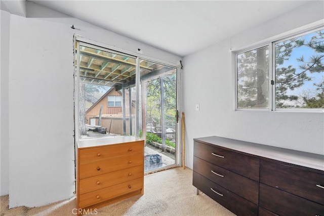 30919 Valley Oak Dr, Running Springs, CA 92382 - bedroom featuring access to exterior and light colored carpet