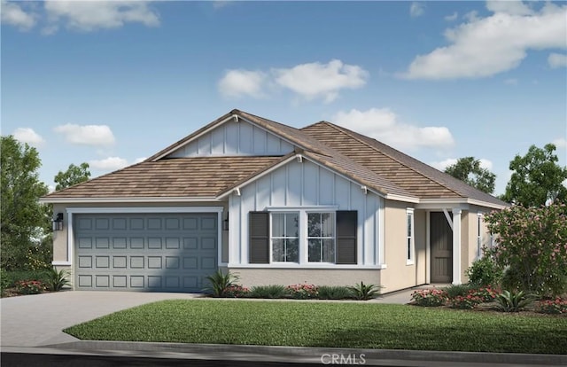 view of front of property featuring driveway, a front lawn, board and batten siding, and an attached garage