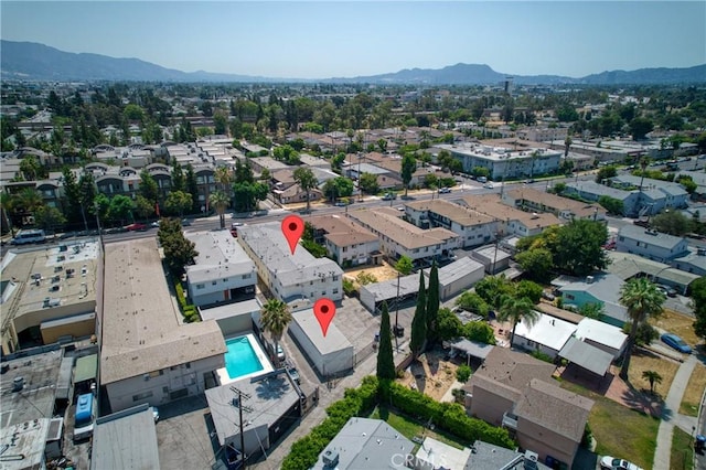 bird's eye view with a mountain view