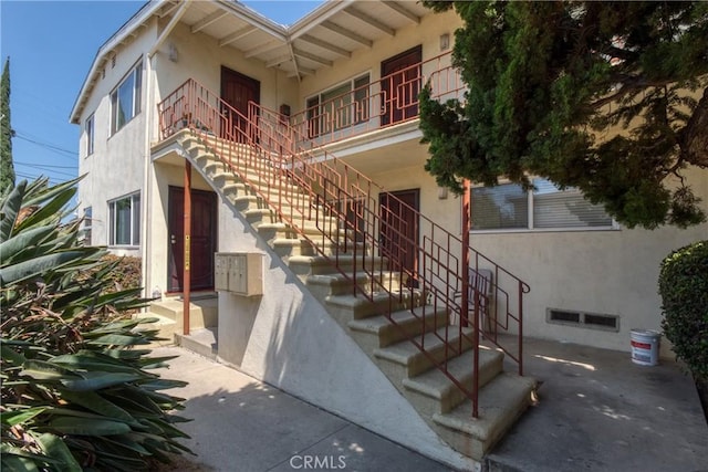 view of building exterior with stairs