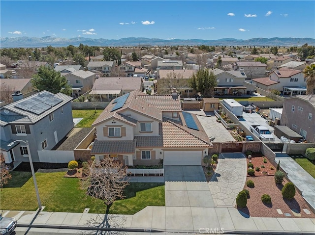 bird's eye view featuring a residential view and a mountain view