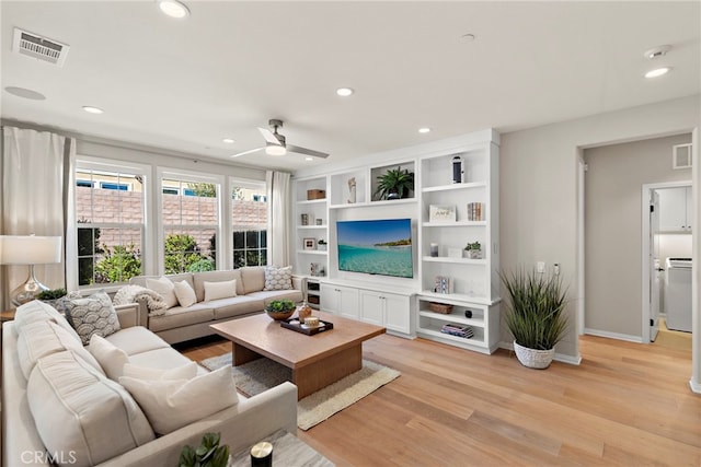 living room with light wood-style floors, recessed lighting, visible vents, and ceiling fan