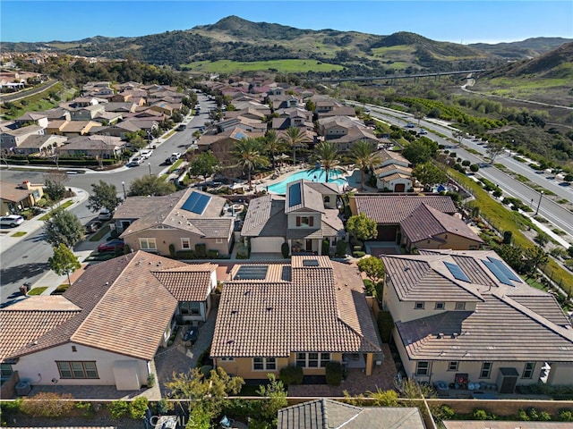 bird's eye view featuring a residential view and a mountain view