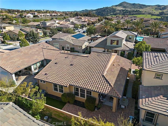 bird's eye view with a residential view and a mountain view