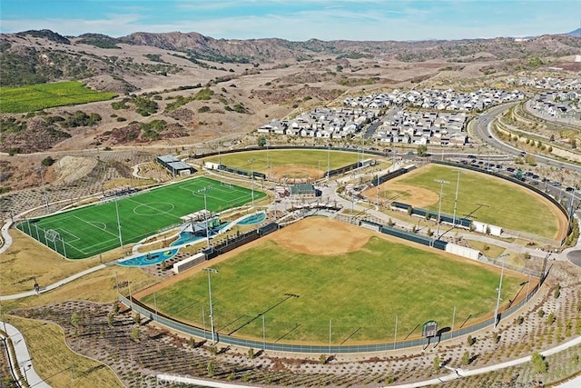 birds eye view of property featuring a mountain view