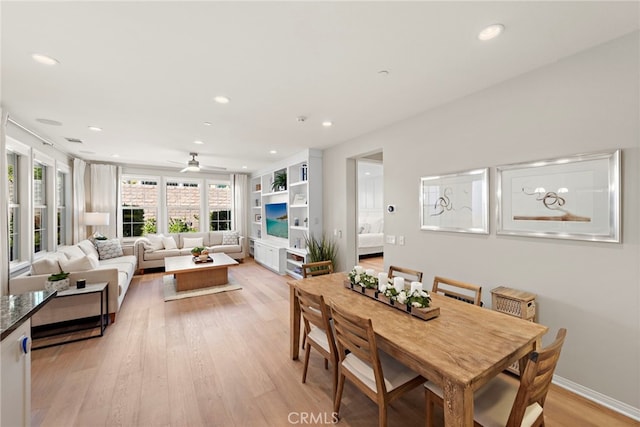 dining space featuring recessed lighting, visible vents, light wood-style floors, a ceiling fan, and baseboards