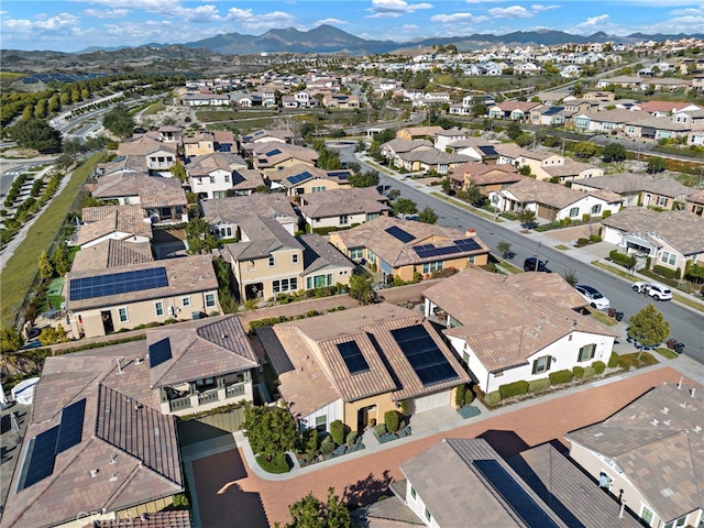 aerial view with a mountain view and a residential view