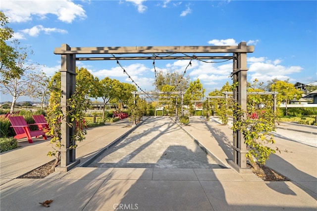 surrounding community featuring a pergola