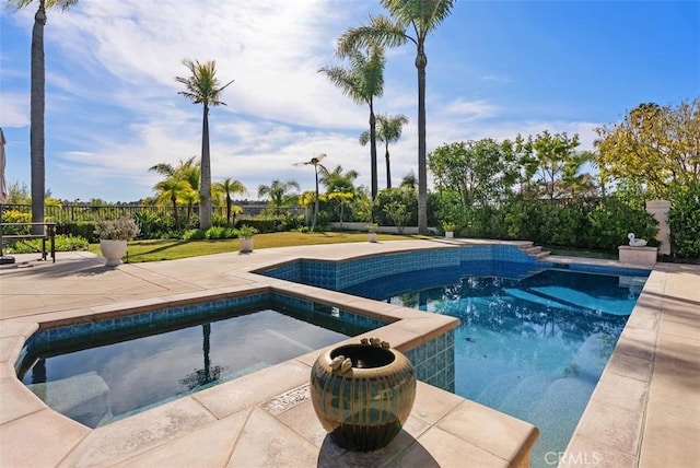 view of pool with a patio area, fence, and a fenced in pool