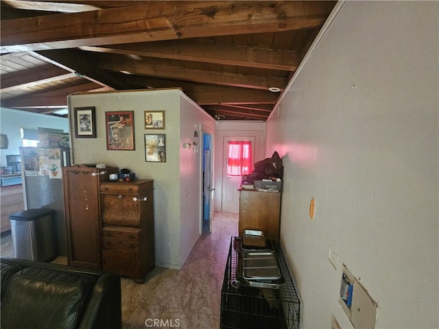 hall with vaulted ceiling with beams and wood ceiling