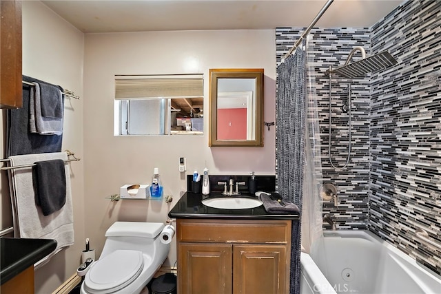 full bath with a combined bath / shower with jetted tub, vanity, and toilet