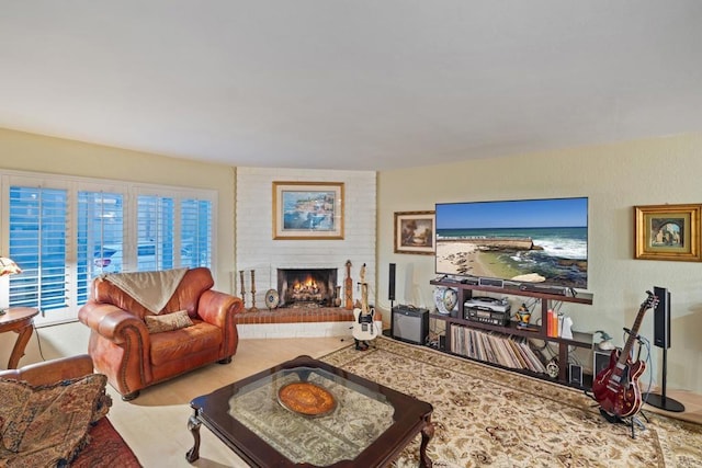 living room with a brick fireplace and wood finished floors