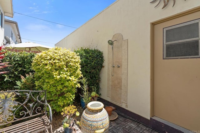 exterior space featuring stucco siding