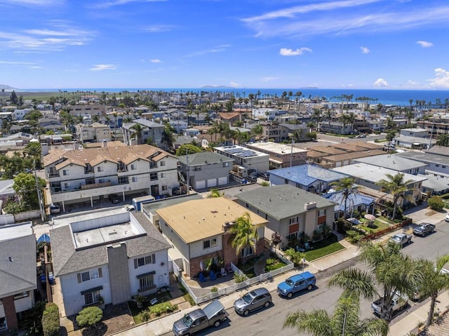 aerial view with a water view and a residential view