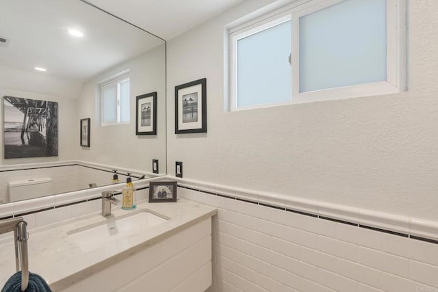 255 Daisy, Imperial Beach, CA 91932 - bathroom with vanity, recessed lighting, wainscoting, and tile walls