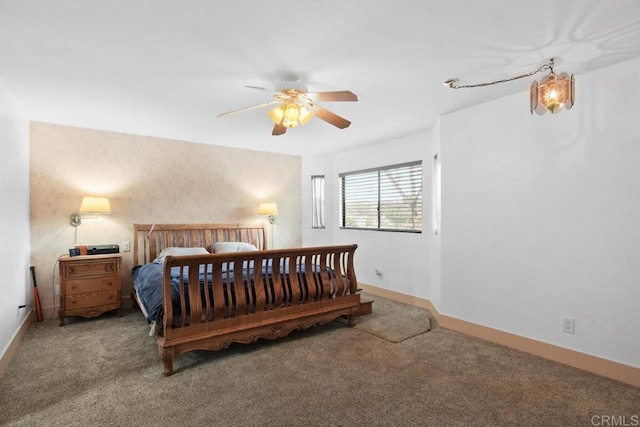 bedroom featuring carpet floors, ceiling fan, and baseboards