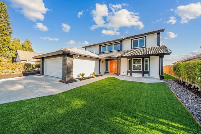 view of front of home featuring an attached garage, a tile roof, fence, driveway, and a front lawn