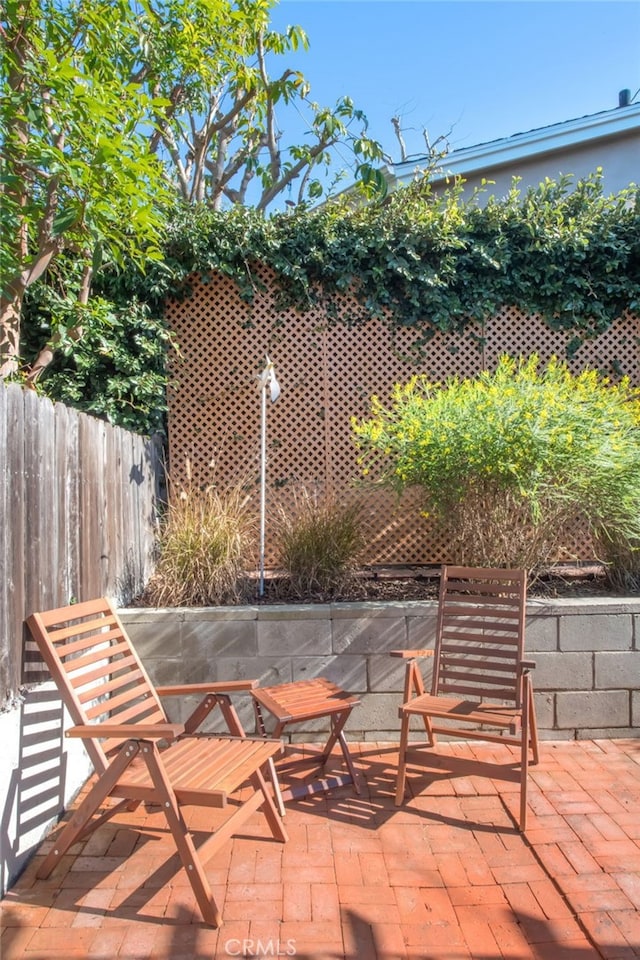 view of patio / terrace with fence