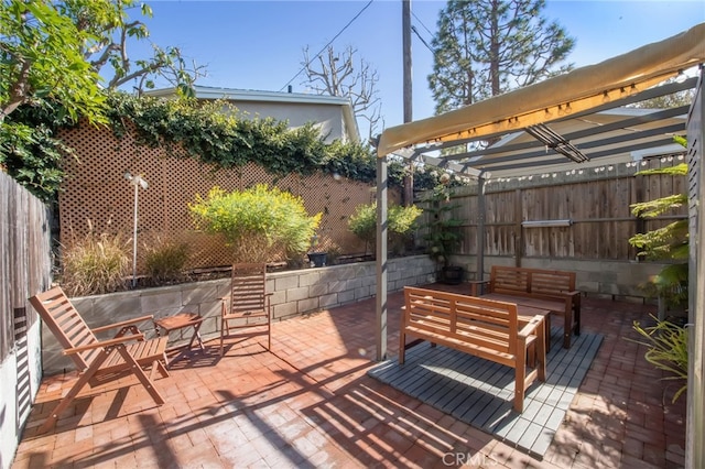 view of patio / terrace featuring a fenced backyard and an outdoor hangout area